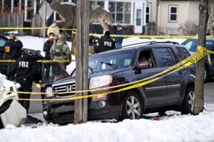 Members of law enforcement work the scene following a suspected shooting by an ICE agent during federal law enforcement operations on January 07, 2026 in Minneapolis, Minnesota.