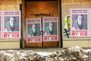 Businesses boarded up in parts of Minneapolis display posters of Renee Nicole Good on plywood-covered windows following her fatal shooting by an ICE agent, in Minneapolis, Minnesota, on January 11, 2026.