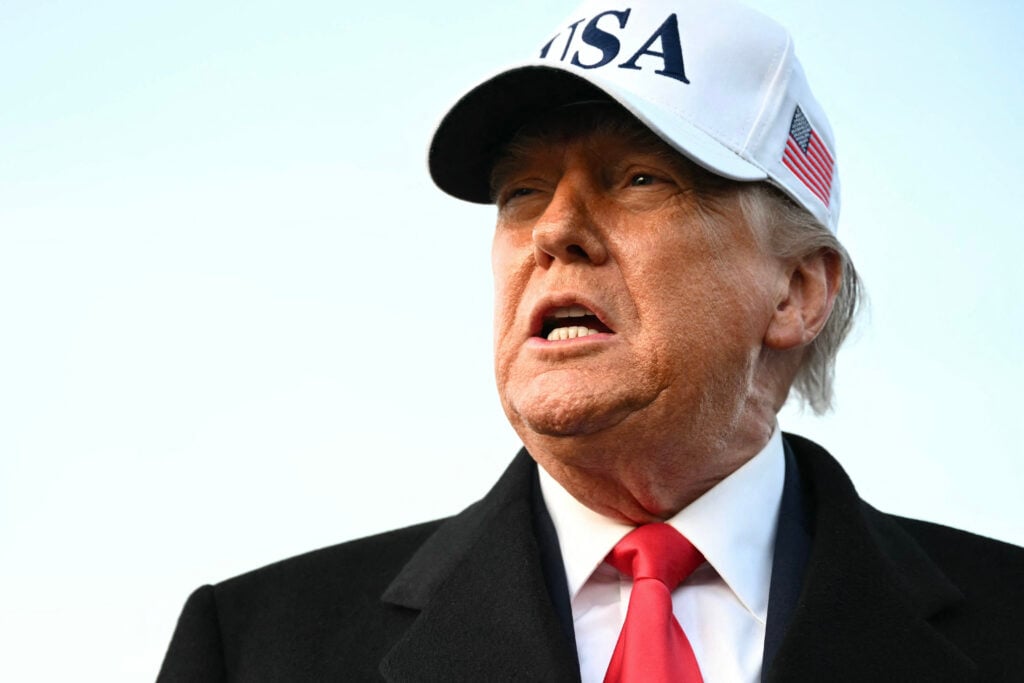 US President Donald Trump speaks to the press upon returning to Joint Base Andrews in Maryland on January 13, 2026.