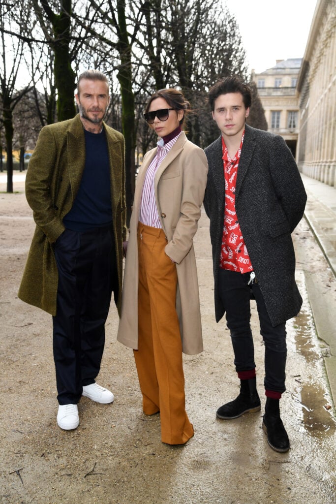 David Beckham, Victoria Beckham and Brooklyn Beckham attend the Louis Vuitton Menswear Fall/Winter 2018-2019 show as part of Paris Fashion Week on January 18, 2018 in Paris, France. 