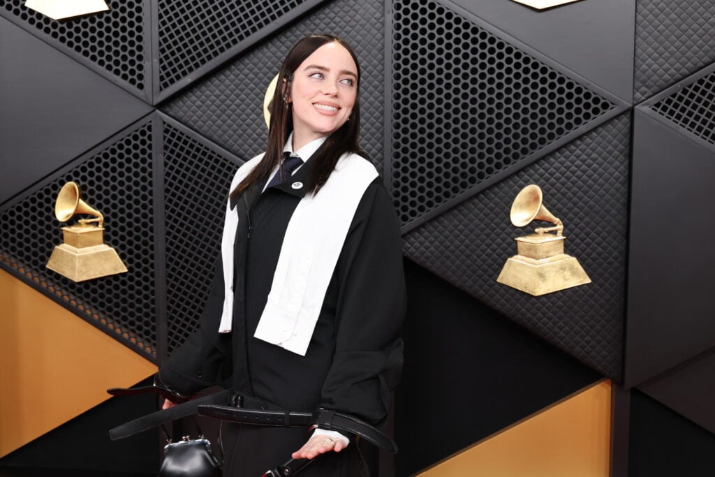 Billie Eilish displays her ring at the 2026 Grammy Awards.