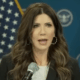Appearing on YouTube, Kristi Noem speaks.