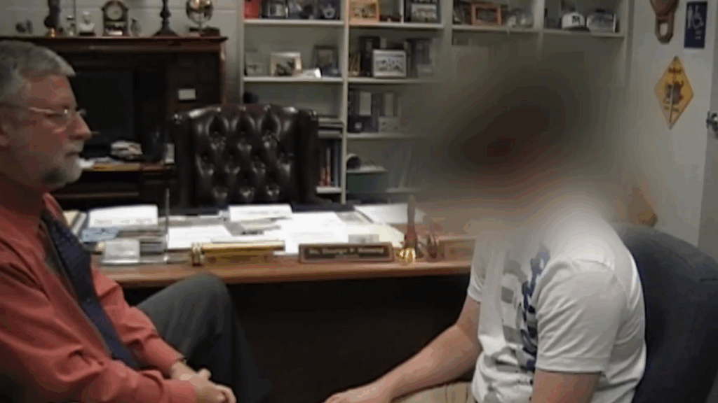 Dr. George Kenney with a student.