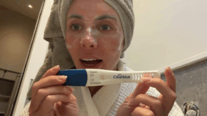 Bonnie Blue holds up an alleged positive pregnancy test.