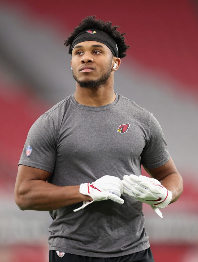 Wide receiver Rondale Moore #4 of the Arizona Cardinals warms up before the NFL game against the Los Angeles Rams at State Farm Stadium on November 26, 2023 in Glendale, Arizona.