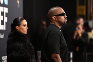 US rapper and producer Kanye West (R) and Australian model Bianca Censori arrive for the 67th Annual Grammy Awards at the Crypto.com Arena in Los Angeles on February 2, 2025.