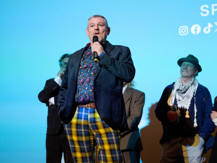 John Davidson speaks on stage during the London gala screening of 