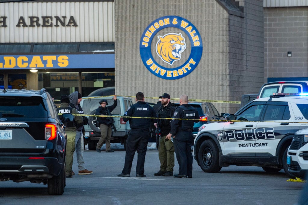 Police stand outside the perimeter they created around the Dennis M. Lynch Arena where a shooting occurred earlier today in Pawtucket, Rhode Island, on February 16, 2026.