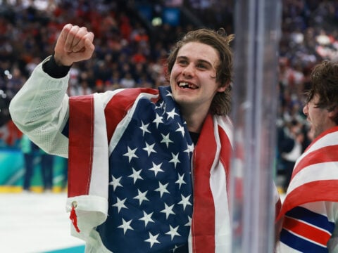 Jack Hughes #86 of Team United States celebrates after their gold-medal win during the Men's Gold Medal match between Canada and the United States on day 16 of the Milano Cortina 2026 Winter Olympic games at Milano Santagiulia Ice Hockey Arena on February 22, 2026 in Milan, Italy.