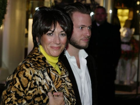 Socialite Ghislane Maxwell with an unidentified male companion attends the Opening of the Asprey Flagship Store on 5th Avenue December 8, 2003 in New York City.