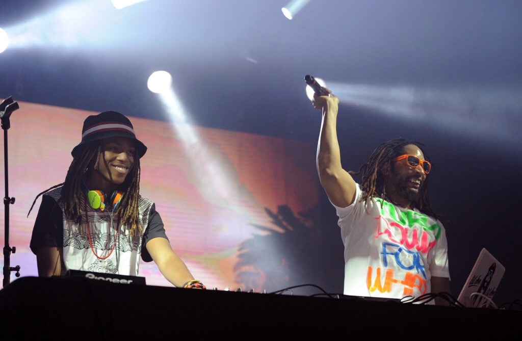 Nathan Smith alias DJ Young Slade (L) en Lil Jon treden op tijdens het Amplify 2014-concert van 97.1 AMP RADIO in het Hollywood Palladium op 22 maart 2014 in Hollywood, Californië.  