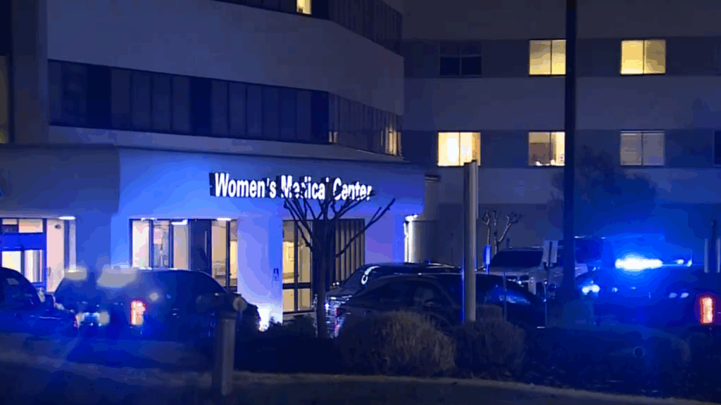 The Brookswood Hospital Women's Center, illuminated by police lights.