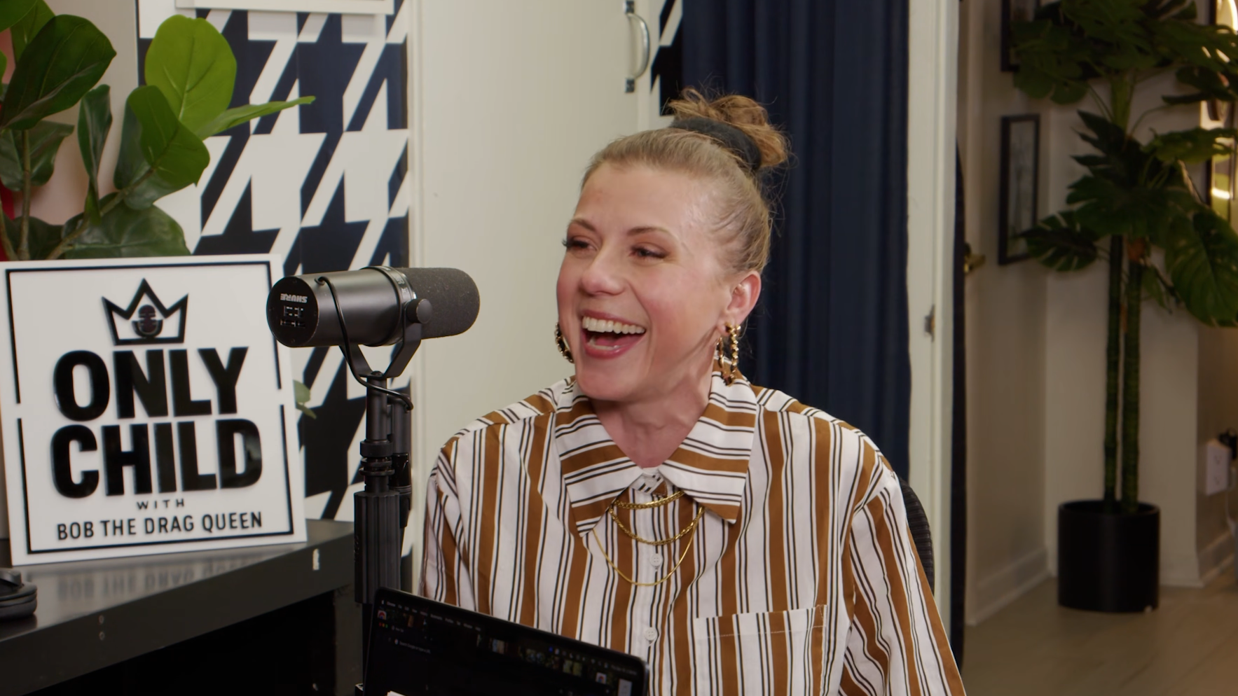 Jodie Sweetin laughs on the Only Child podcast.