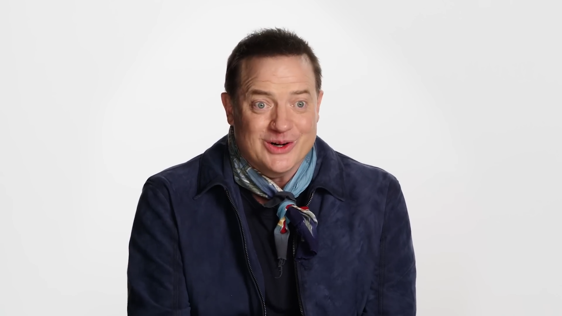 Brendan Fraser in front of an empty void.