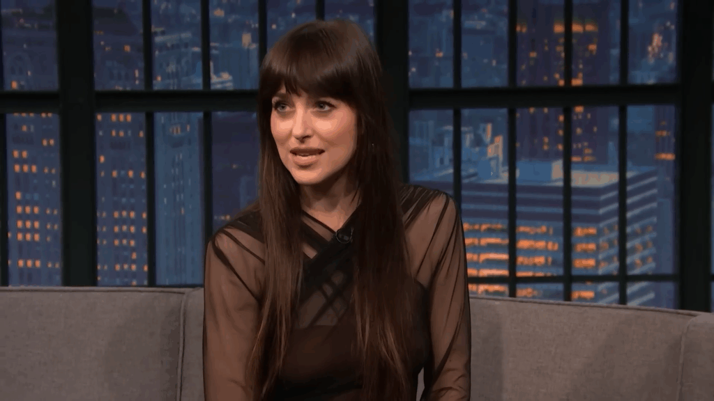 Dakota Johnson talks to the audience.