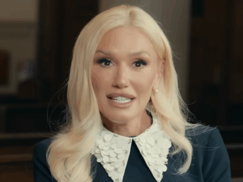 Gwen Stefani looks into the camera in a church