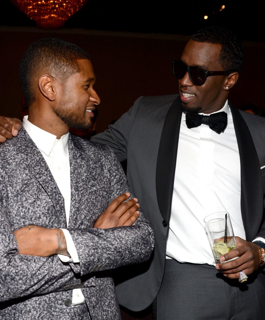 Usher en Diddy in februari 2013.