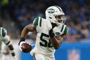 Darron Lee #58 of the New York Jets runs the ball in the third quarter against the Detroit Lions at Ford Field on September 10, 2018 in Detroit, Michigan.