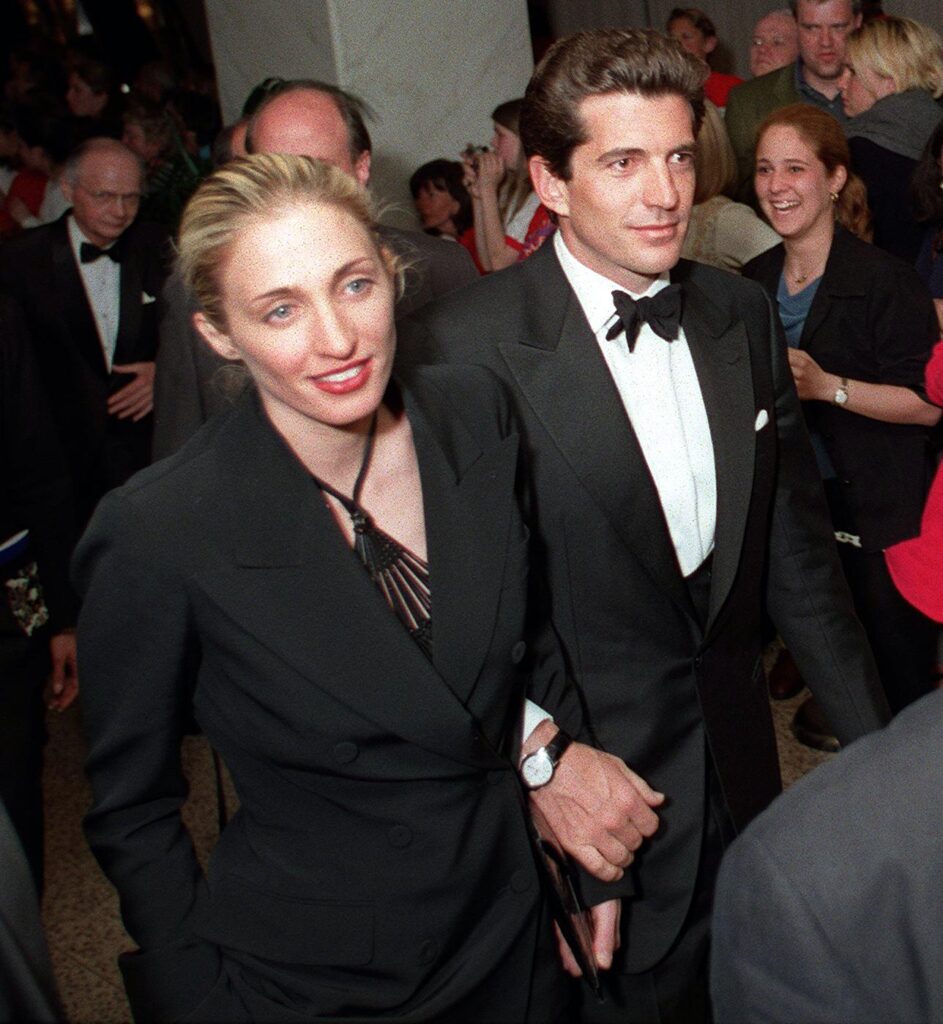 This 01 May, 1999, file shows John F. Kennedy Jr. and his wife Carolyn Bissette as they leave at the end of the White House Correspondent's annual dinner in Washington, DC, 01 May.    