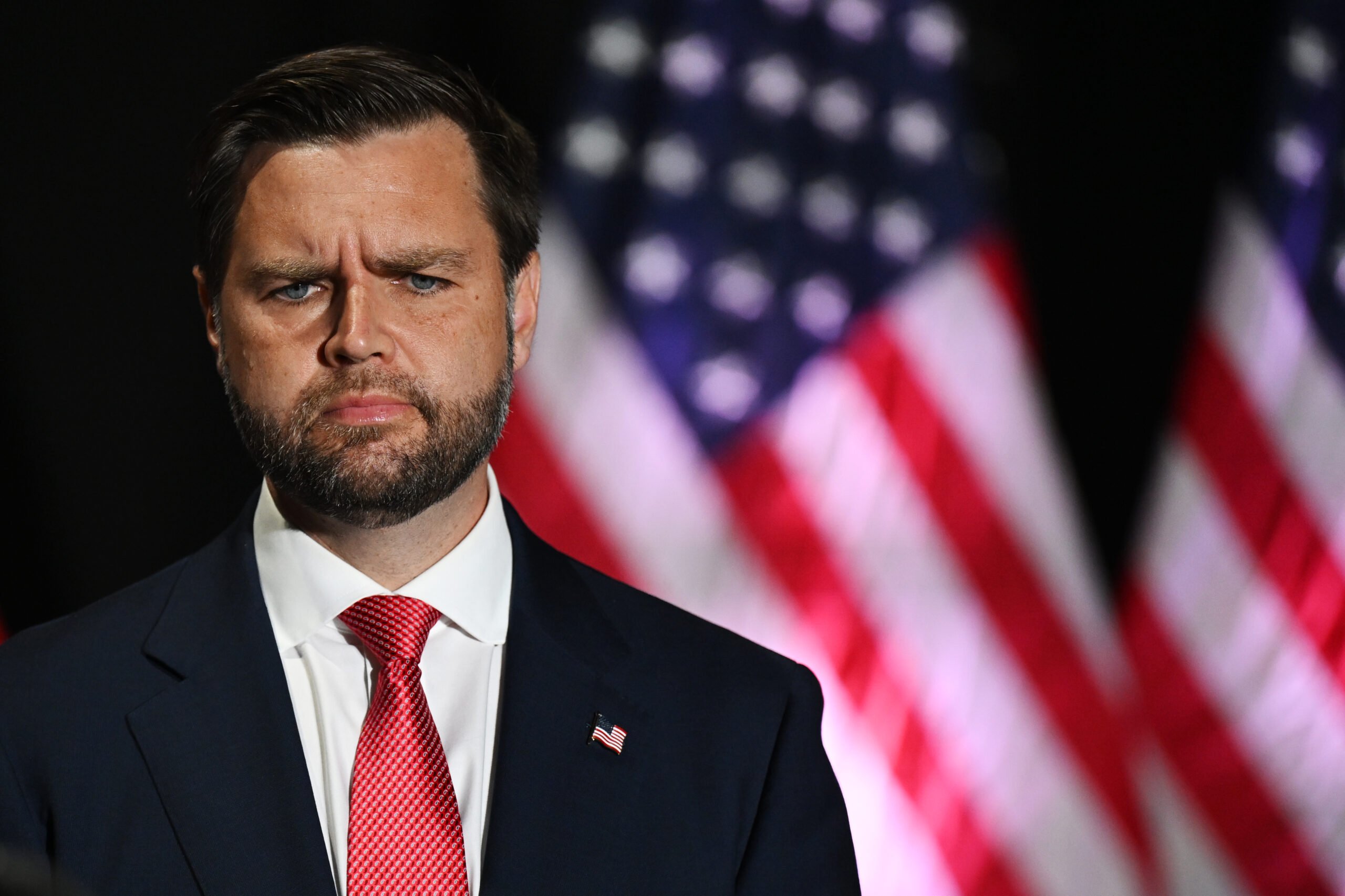 Republican vice presidential candidate Senator J.D. Vance (R-Ohio) listens to a speaker during a campaign rally at 2300 Arena on August 6, 2024 in Philadelphia, Pennsylvania.