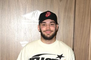 Adin Ross walks the blue carpet at JAY-Z's Iconic The 40/40 Club in partnership with Fanatics Sportsbook at the center of Fanatics Fest NYC at Jacob Javits Center on August 16, 2024 in New York City.