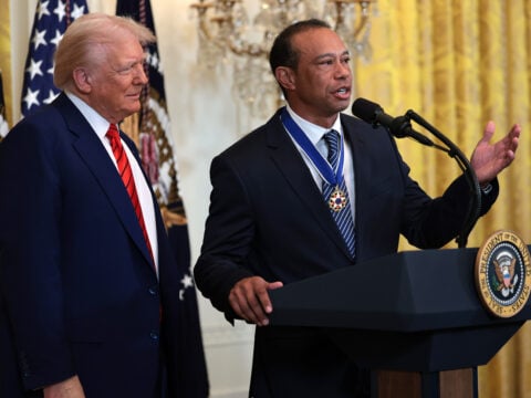 Golf legend Tiger Woods speaks alongside U.S. President Donald Trump during a reception honoring Black History Month in the East Room of the White House on February 20, 2025 in Washington, DC.