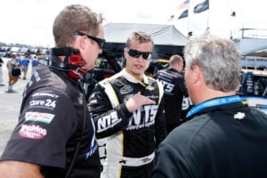 Chase Pistone, driver of the #9 NTS Motorsports Chevrolet, talks with his crew during practice for the NASCAR Camping World Series UNOH 225 at Kentucky Speedway on June 26, 2014 in Sparta, Kentucky.