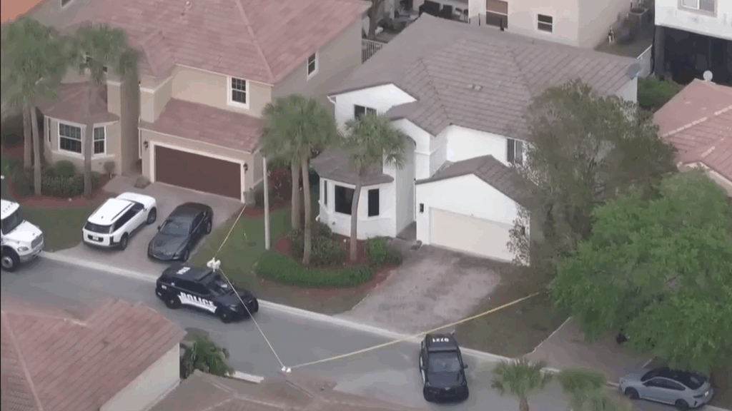 The home of late Vice Mayor Nancy Metayer Bowen marked off with police tape.