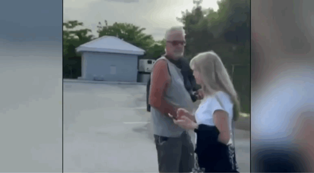 Brian Hooker avoids CBS News cameras in the Bahamas.