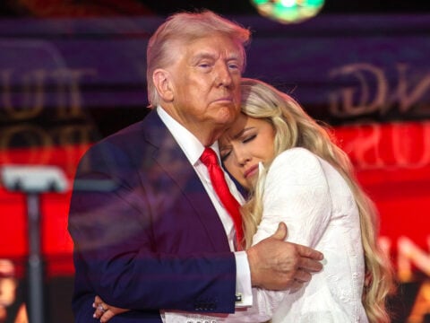 Erika Kirk joins U.S. President Donald Trump onstage during the memorial service for political activist Charlie Kirk at State Farm Stadium on September 21, 2025 in Glendale, Arizona.