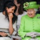 Queen Elizabeth II sits and laughs with Meghan, Duchess of Sussex during a ceremony to open the new Mersey Gateway Bridge on June 14, 2018 in the town of Widnes in Halton, Cheshire, England.