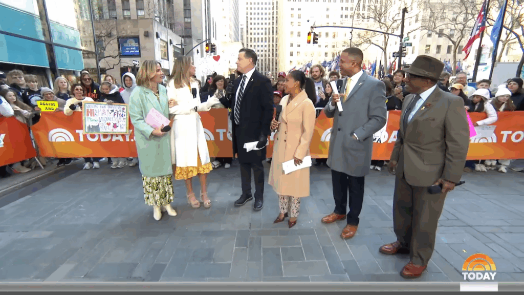 Savannah Guthrie outside with coworkers and fans on her first day back.