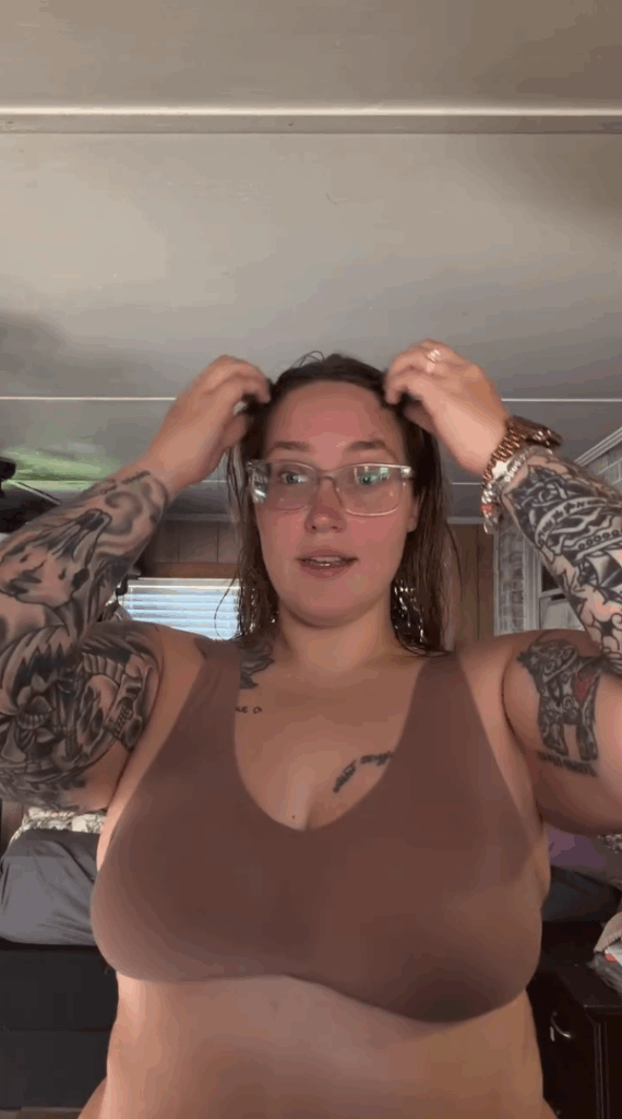 Lauryn Pumpkin Shannon in a brown bra.