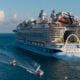 In an aerial view, Royal Caribbean's Icon of the Seas, billed as the world's largest cruise ship, heads out to sea for its second voyage from PortMiami on February 03, 2024, in Miami, Florida.