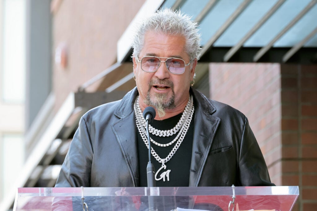 Guy Fieri speaks onstage at the Hollywood Walk of Fame Star Ceremony honoring Sammy Hagar on April 30, 2024 in Hollywood, California. 