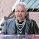 Guy Fieri speaks onstage at the Hollywood Walk of Fame Star Ceremony honoring Sammy Hagar on April 30, 2024 in Hollywood, California.