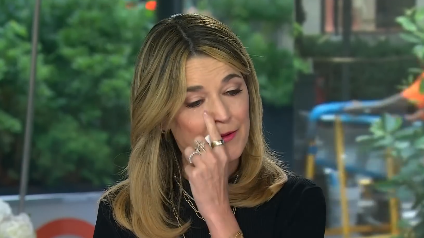 Savannah Guthrie wipes away a tear on June 23, 2026.