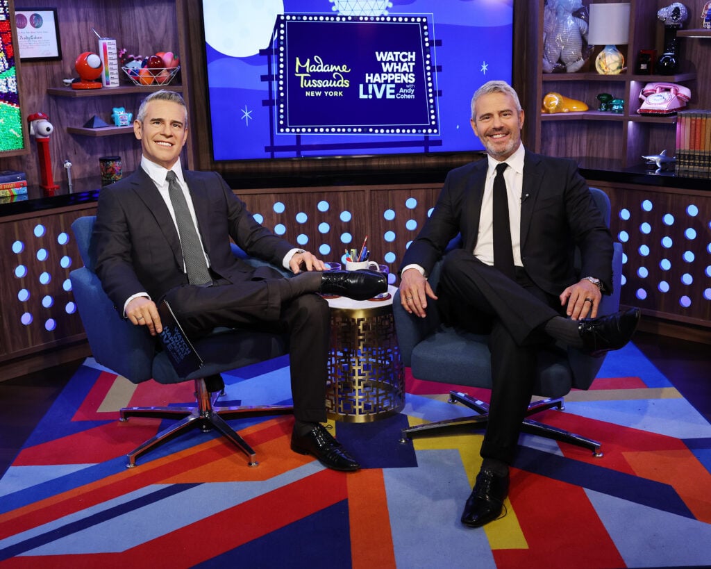 Andy Cohen poses side by side with his Madame Tussauds wax figure at the reveal of Andy Cohen Wax Figure In Perfectly Replicated â€œWatch What Happens Live With Andy Cohenâ€ Set at Madame Tussauds on August 15, 2024 in New York City.  