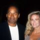 O.J. Simpson and Nicole Brown Simpson pose at the premiere of the "Naked Gun 33 1/3: The Final Isult" in which O.J. starred on March 16, 1994 in Los Angeles, California.