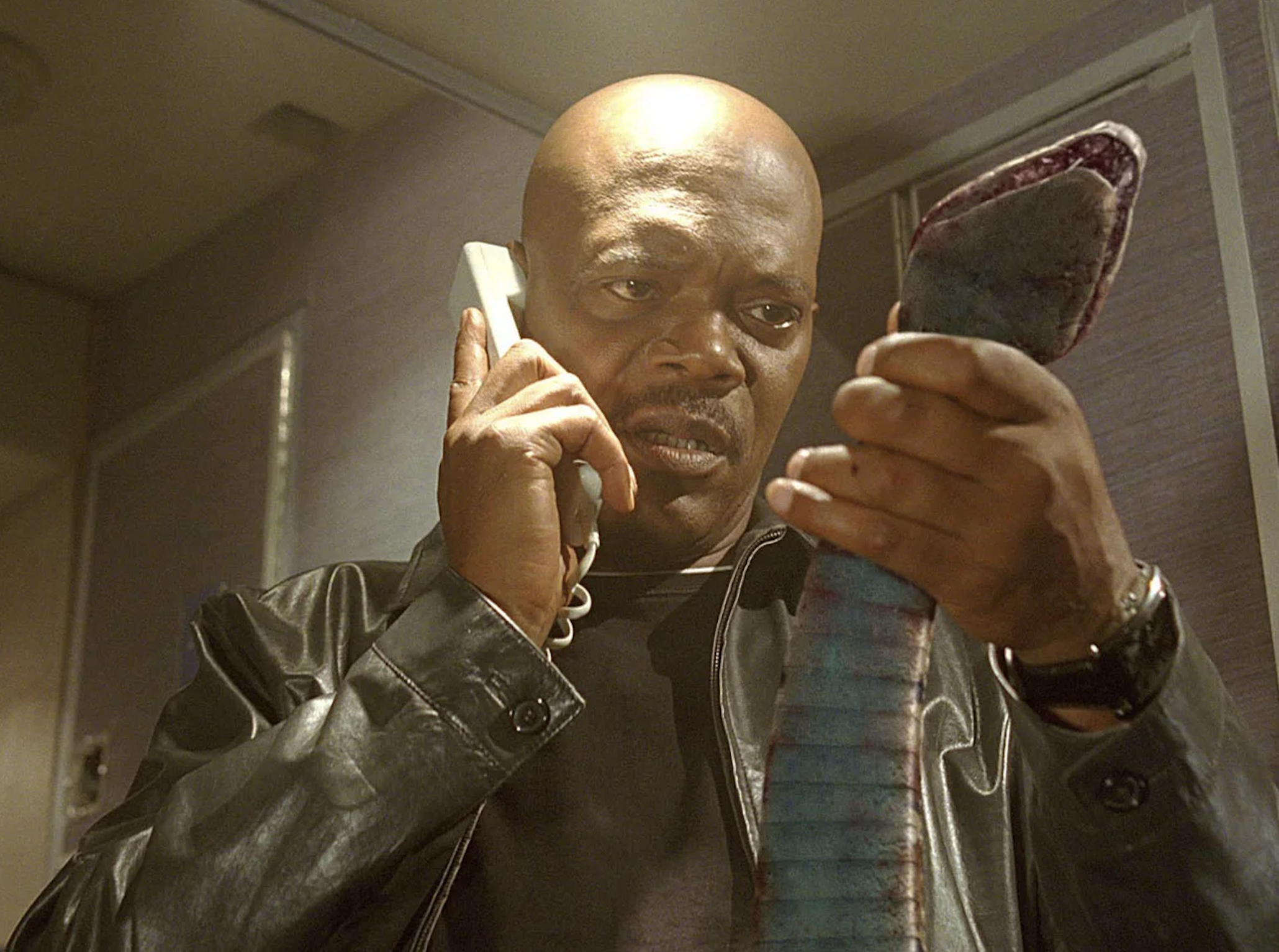 Samuel L. Jackson confronts a snake on a plane.