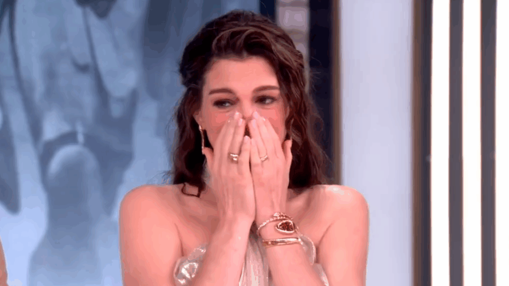 Anne Hathaway tears up on The View.