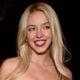 Sydney Sweeney smiles in December 2025.