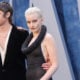Mark Foster and Julia Garner attend the 2023 Vanity Fair Oscar Party Hosted By Radhika Jones at Wallis Annenberg Center for the Performing Arts on March 12, 2023 in Beverly Hills, California.
