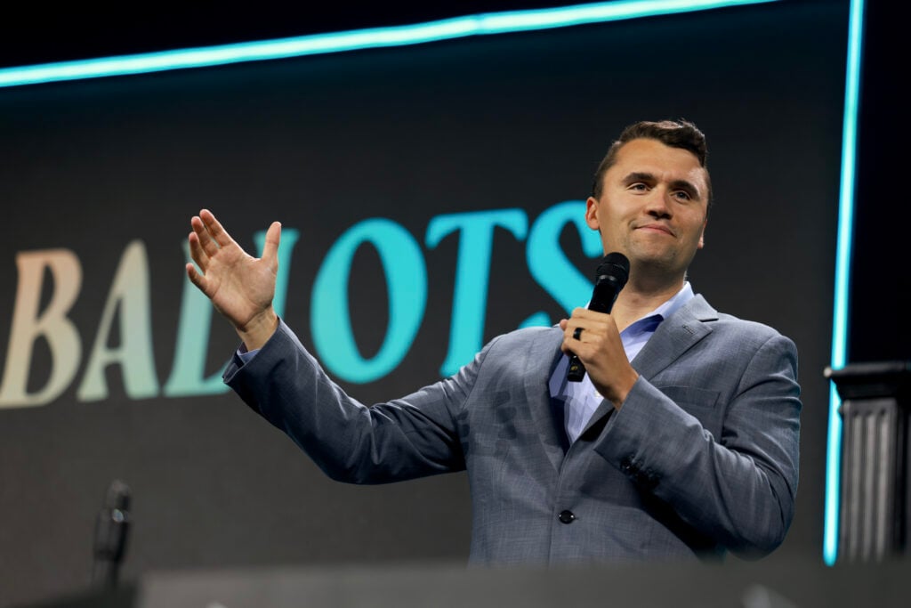 Charlie Kirk, who founded Turning Point USA, speaks before former President Donald Trump's arrival during a Turning Point USA Believers Summit conference at the Palm Beach Convention Center on July 26, 2024 in West Palm Beach, Florida. 
