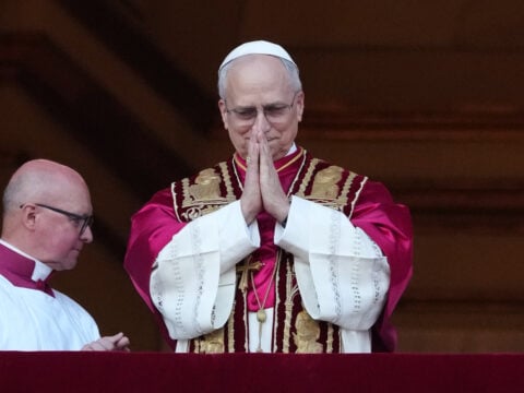 The newly elected Pontiff, Pope Leo XIV is seen for the first time from the Vatican balcony on May 8, 2025 in Vatican City, Vatican.