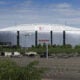 A Marine Helicopter Squadron One (HMX-1)(far right) prepares to fly past the State Farm Stadium, home of the Arizona Cardinals.