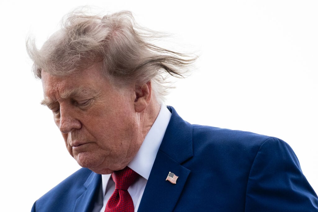 Donald Trump leaves Air Force One on August 7, 2026.