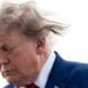 Donald Trump leaves Air Force One on August 7, 2026.