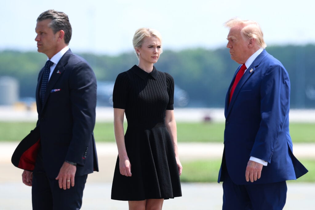 U.S. Secretary of War Pete Hegseth, executive assistant to U.S. President Donald Trump Natalie Harp and U.S. President Donald Trump attend a dignified transfer at Dover Air Force Base on July 22, 2026 in Dover, Delaware.