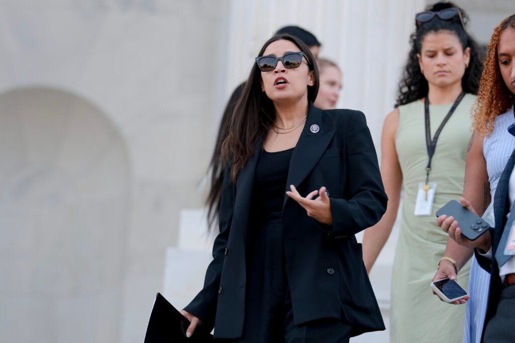 U.S. Rep. Alexandria Ocasio-Cortez (D-NY) speaks to reporters on the House steps after a series of votes at the U.S. Capitol on July 22, 2026 in Washington, DC.